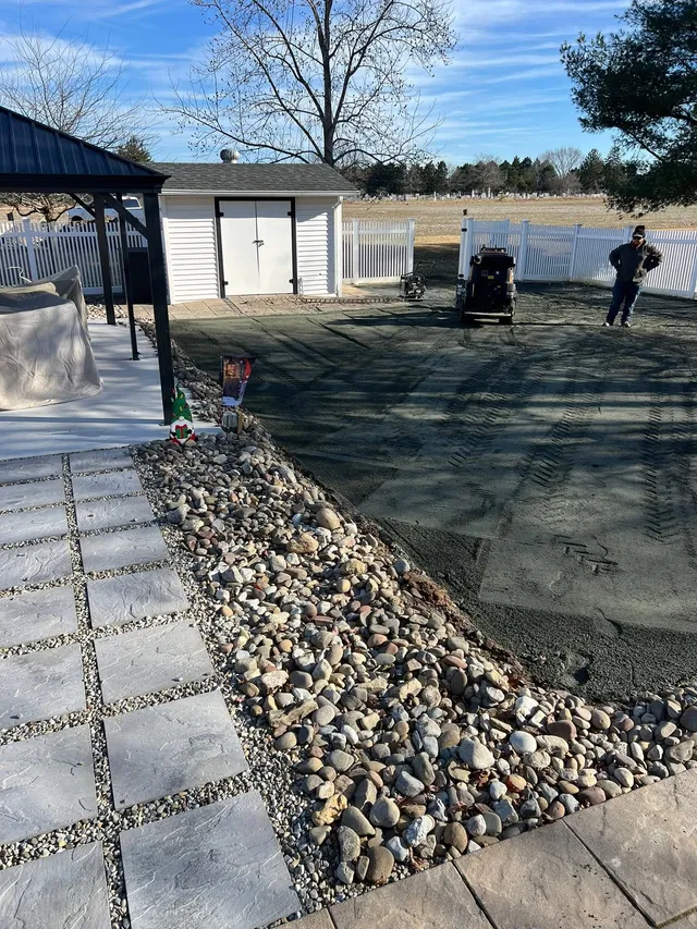 Concrete driveway pour and hardscape installation